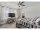 Spacious bedroom with large windows and ceiling fan at 5188 Country Pine Dr., Myrtle Beach, SC 29579