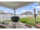 Covered patio with grill and outdoor seating at 5188 Country Pine Dr., Myrtle Beach, SC 29579