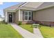 Tan house with walkway and landscaping at 5188 Country Pine Dr., Myrtle Beach, SC 29579