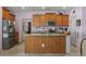 Modern kitchen with wood cabinets and granite countertops at 5188 Country Pine Dr., Myrtle Beach, SC 29579