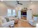 Relaxing living room with sectional sofa and built-in media cabinet at 8165 Living Tide Dr., Myrtle Beach, SC 29572