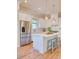 Bright kitchen with white cabinets, stainless steel appliances, and island at 8165 Living Tide Dr., Myrtle Beach, SC 29572