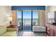 Living room with ocean view and balcony access at 1200 N Ocean Blvd. # 1002, Myrtle Beach, SC 29577