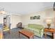 Condo living room with seating and ocean view at 1200 N Ocean Blvd. # 1002, Myrtle Beach, SC 29577