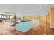 Indoor pool and hot tub with lounge chairs at 1200 N Ocean Blvd. # 1002, Myrtle Beach, SC 29577
