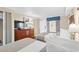 Bedroom with two beds, dresser, and access to a balcony at 1200 N Ocean Blvd. # 1002, Myrtle Beach, SC 29577