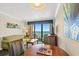 Condo living room with ocean view and seating at 1200 N Ocean Blvd. # 1002, Myrtle Beach, SC 29577