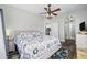 Main bedroom with king-size bed and access to bathroom at 4503 W Harbour Circle # S1, Little River, SC 29566