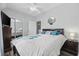 Guest bedroom with a queen-size bed and mirrored closet at 4503 W Harbour Circle # S1, Little River, SC 29566