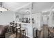 Modern kitchen with white cabinets, breakfast bar, and stainless steel appliances at 4503 W Harbour Circle # S1, Little River, SC 29566
