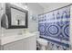 Clean bathroom with a shower/tub combo and patterned shower curtain at 4503 W Harbour Circle # S1, Little River, SC 29566