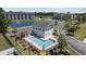 Resort-style pool with surrounding lounge chairs and a clubhouse at 4503 W Harbour Circle # S1, Little River, SC 29566