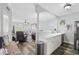 Open kitchen with breakfast bar, white cabinets, and a view of the living room at 4503 W Harbour Circle # S1, Little River, SC 29566