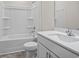 Clean bathroom with a tub, toilet and vanity at 3050 Deerberry Place, Longs, SC 29568
