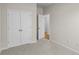 Bedroom with double doors to closet and access to another room at 3050 Deerberry Place, Longs, SC 29568