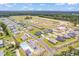 Aereal view of a community with houses, pool, and a pond at 938 Oak Hollow St., Longs, SC 29568