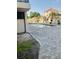 Community pool and hot tub area with brick pavers and seating at 7509 N Ocean Blvd., Myrtle Beach, SC 29572