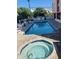 Inviting community pool and hot tub with plenty of lounge chairs at 7509 N Ocean Blvd., Myrtle Beach, SC 29572