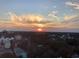 Spectacular sunset aerial view overlooking the coastline and residential areas at 7509 N Ocean Blvd., Myrtle Beach, SC 29572
