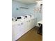 On-site laundry facility with several washers and dryers at 7509 N Ocean Blvd., Myrtle Beach, SC 29572