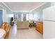 Living room with tile floors and balcony access at 9620 Shore Dr. # 303, Myrtle Beach, SC 29572