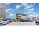 Building exterior with parking and ocean view at 9620 Shore Dr. # 303, Myrtle Beach, SC 29572
