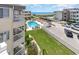 Community pool with many people swimming and relaxing at 9620 Shore Dr. # 303, Myrtle Beach, SC 29572