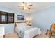 Bedroom with double bed, ceiling fan and ocean view at 9620 Shore Dr. # 303, Myrtle Beach, SC 29572