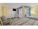 Bedroom with two twin beds and a small table and chairs at 2701 South Ocean Blvd. # 710, North Myrtle Beach, SC 29582