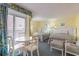 Condo bedroom with two beds, and access to a balcony at 2701 South Ocean Blvd. # 710, North Myrtle Beach, SC 29582