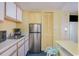 Small condo kitchenette with stainless steel appliances at 2701 South Ocean Blvd. # 710, North Myrtle Beach, SC 29582
