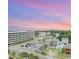 Aerial view of parking lot and surrounding buildings at sunset at 2701 South Ocean Blvd. # 710, North Myrtle Beach, SC 29582