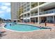 Outdoor pool with many people swimming at 2701 South Ocean Blvd. # 710, North Myrtle Beach, SC 29582