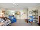 Living room with seating, a view of kitchen, and dining area at 194 South Cove Pl. # D, Pawleys Island, SC 29585