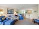 Living room with comfortable seating and view of kitchen and dining area at 194 South Cove Pl. # D, Pawleys Island, SC 29585