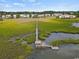 Drone view showcasing a community with water access and private dock at 194 South Cove Pl. # D, Pawleys Island, SC 29585