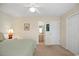 Bright bedroom with a queen bed and en-suite bathroom access at 194 South Cove Pl. # D, Pawleys Island, SC 29585