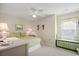 Spacious bedroom with a queen bed and built-in window seat at 194 South Cove Pl. # D, Pawleys Island, SC 29585