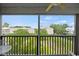 Relaxing screened porch with outdoor seating and community views at 194 South Cove Pl. # D, Pawleys Island, SC 29585