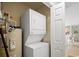 Convenient stackable washer and dryer in a closet at 194 South Cove Pl. # D, Pawleys Island, SC 29585