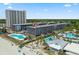 Aerial view of resort complex near beach, pool, and parking at 5905 S South Kings Hwy. # 106-A, Myrtle Beach, SC 29575