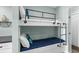 Bunk beds with nautical theme bedding and industrial-style ladder at 5905 S South Kings Hwy. # 106-A, Myrtle Beach, SC 29575