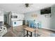 Bright dining area with table and chairs, adjacent to the kitchen and living room at 5905 S South Kings Hwy. # 106-A, Myrtle Beach, SC 29575