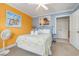 Guest bedroom with a double bed and beach themed art at 919A N Waccamaw Dr., Murrells Inlet, SC 29576