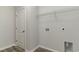 Laundry room with wire shelving and a door to closet at 58 Millsite Ct., Georgetown, SC 29440