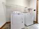 Laundry room with washer, dryer, and shelving at 120 A Da Gullah Way # A, Pawleys Island, SC 29585