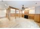 Finished basement with wood flooring, fireplace, and built-in shelving at 120 A Da Gullah Way # A, Pawleys Island, SC 29585