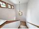 Staircase with wooden railing and carpet at 120 A Da Gullah Way # A, Pawleys Island, SC 29585