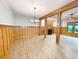Open dining room with chandelier and wood flooring at 120 A Da Gullah Way # A, Pawleys Island, SC 29585