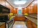 Modern kitchen with granite countertops and stainless steel appliances at 120 A Da Gullah Way # A, Pawleys Island, SC 29585
